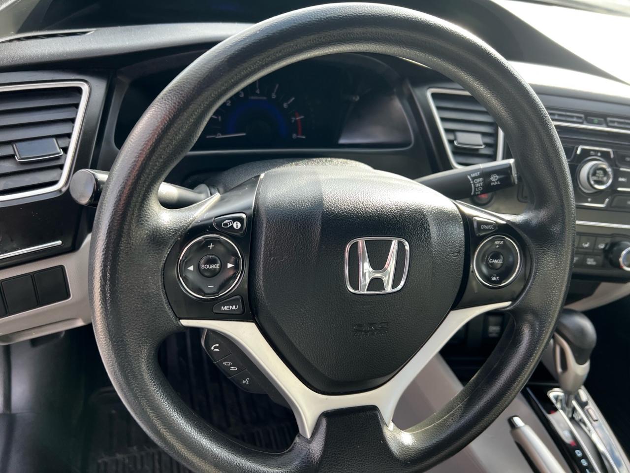 2015 Honda Civic 4dr Auto LX Photo