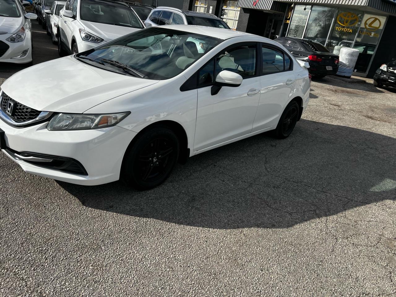 2015 Honda Civic 4dr Auto LX Photo