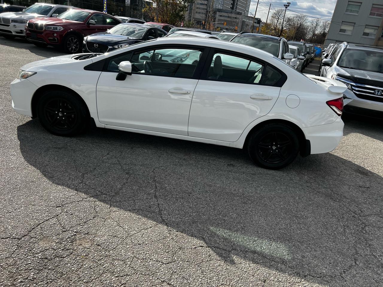 2015 Honda Civic 4dr Auto LX Photo0