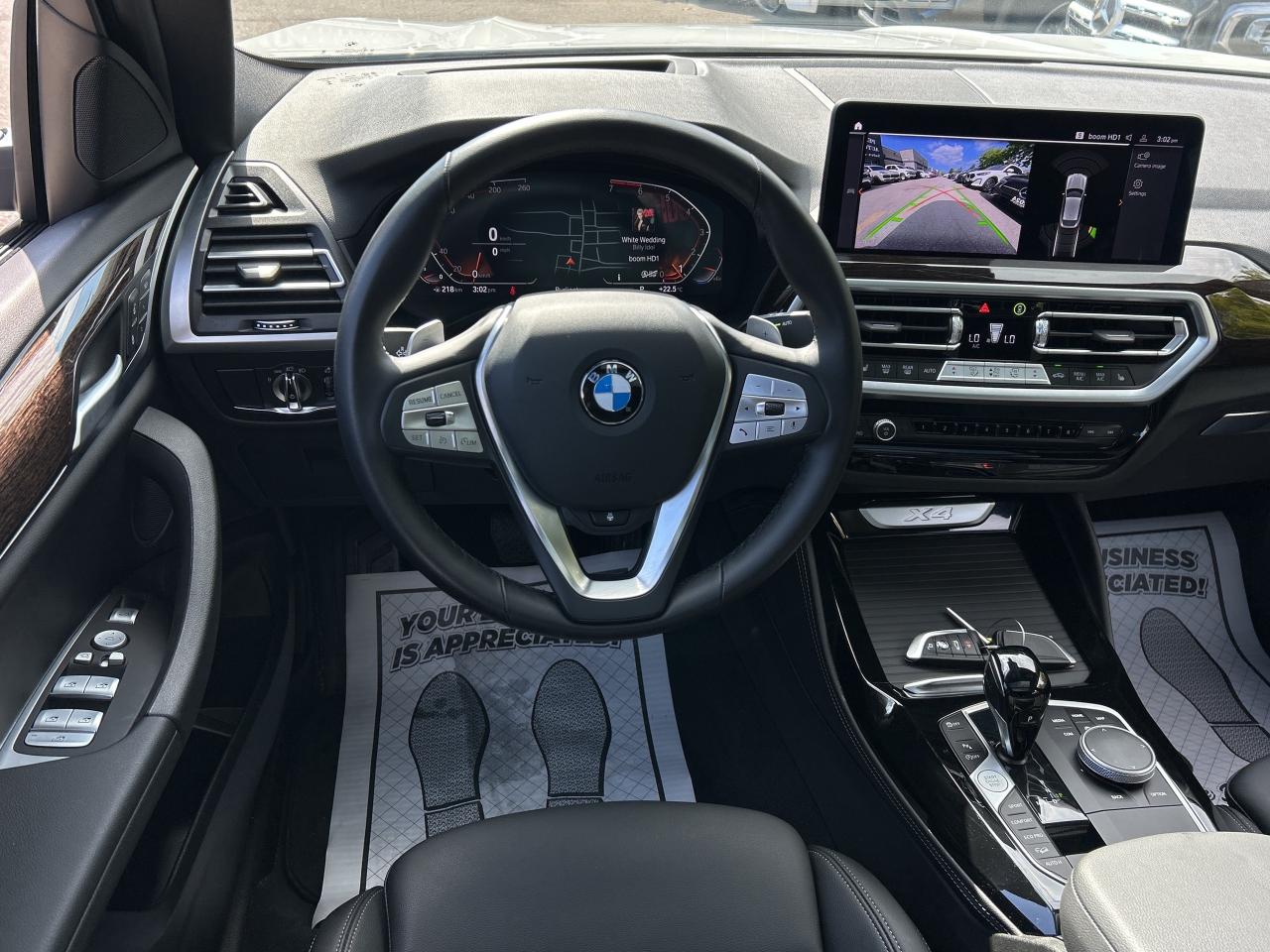 2025 BMW X4 HEADS UP DISPLAY, CARPLAY, PANOROOF,AMBIENT LIGHTS Photo