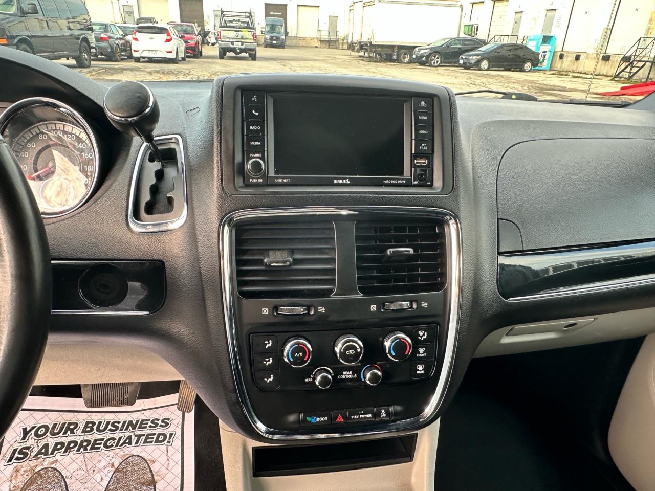 2017 Dodge Grand Caravan SXT Premium Plus ~ DVD ~ PWR DOORS ~ CERTIFIED Photo