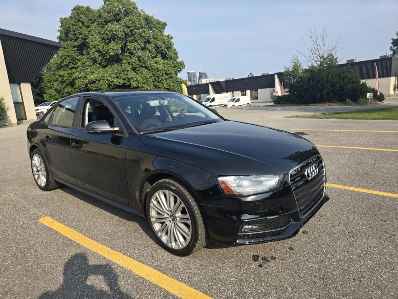 2016 Audi A4 2.0T Premium 4dr All-Wheel Drive quattro Sedan Aut Photo2