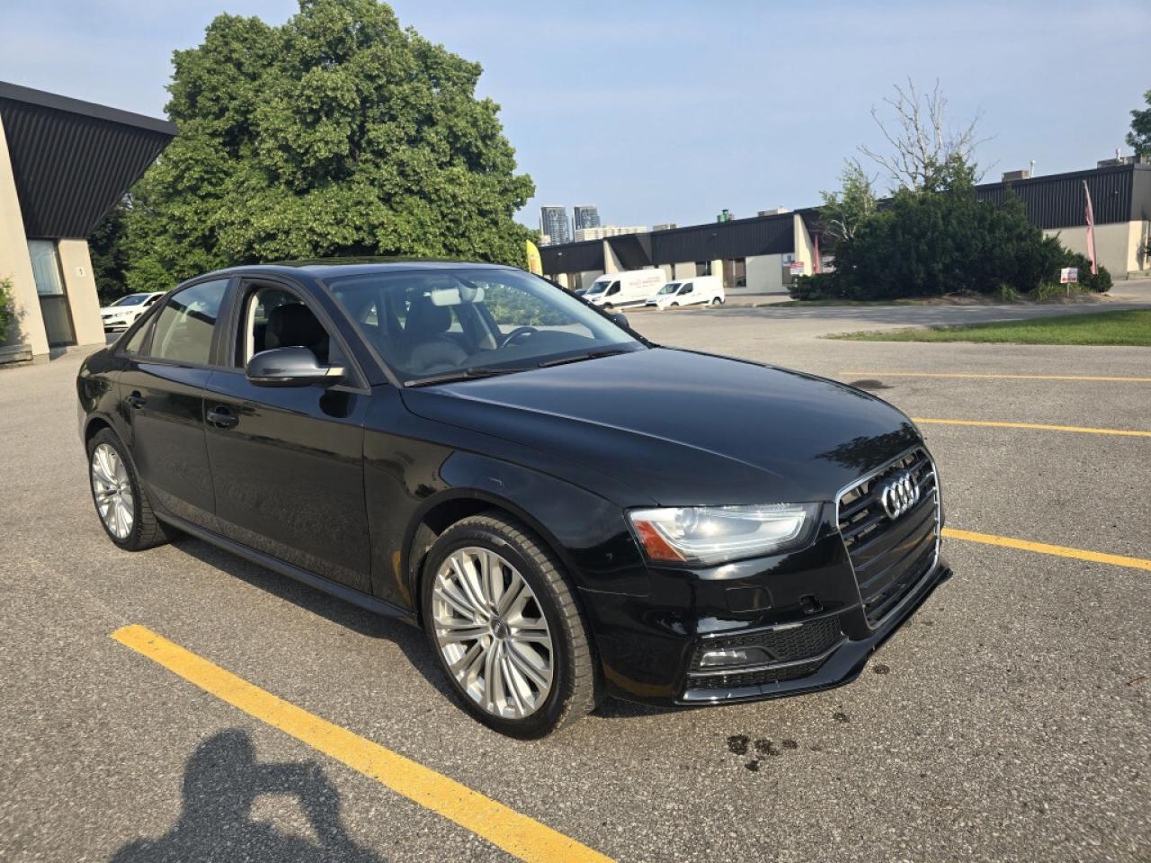 2016 Audi A4 2.0T Premium 4dr All-Wheel Drive quattro Sedan Aut Photo2