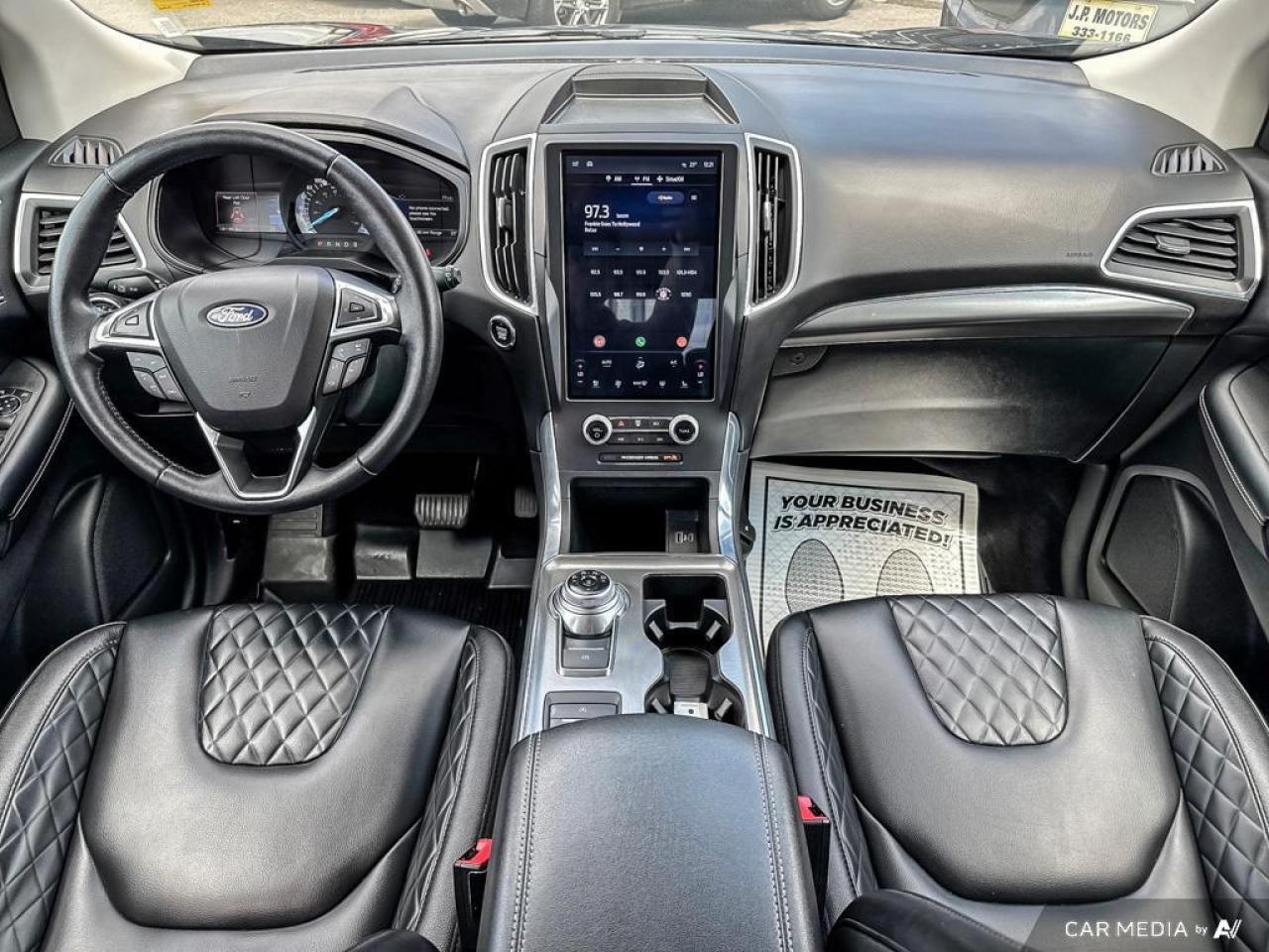 2023 Ford Edge Titanium BACKUP CAM   BLUETOOTH   HTD SEATS   KEYL Photo