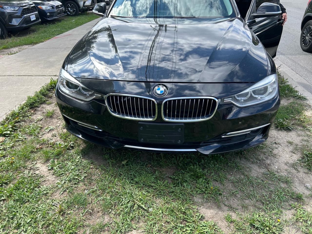 2014 BMW 3 Series 4dr Sdn 328i xDrive AWD Photo