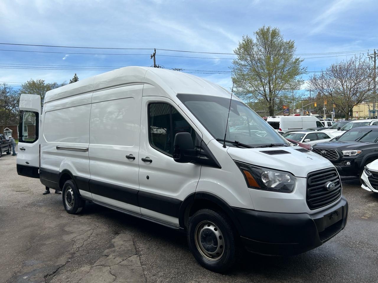 2021 Ford Transit Cargo Van T-250 148 EL Hi Rf 9070 GVWR RWD Photo0
