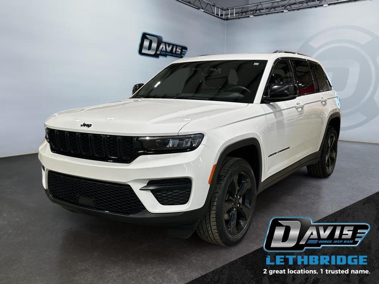 <b>Altitude Pkg - Remote Start - Heated Seats & Steering Wheel - Apple Car Play/Android Auto - Power Liftgate <br /> <br /></b><br /> The 2023 Jeep Grand Cherokee Altitude 4x4 combines modern SUV capability with bold styling and advanced technology. Powered by a proven 3.6L Pentastar V6 engine paired with an 8-speed automatic transmission and the capable Quadra-Trac I® 4WD system, this Grand Cherokee delivers confident performance in all road conditions. Finished in Bright White with the Altitude Appearance Package, it stands out with gloss black exterior accents, black roof rails, and sporty 20-inch gloss black aluminum wheels.<br /><br />Inside, the cabin offers premium comfort and technology designed for everyday driving. Capri leatherette and suede seats, heated front seats, a heated steering wheel, dual-zone automatic climate control, and a power-adjustable drivers seat create a refined interior. The advanced Uconnect® 5 system with an 8.4-inch touchscreen includes Apple CarPlay, Android Auto, SiriusXM, wireless charging, and a 10.25-inch digital driver display, keeping you connected and informed on every journey.<br /><br />Safety and driver assistance features help provide added peace of mind with adaptive cruise control with stop and go, blind spot monitoring with cross path detection, forward collision warning with active braking, active lane management, ParkSense rear park assist, and a ParkView rear backup camera. With its bold Altitude styling, advanced technology, and legendary Jeep capability, this 2023 Jeep Grand Cherokee Altitude 4x4 is a standout choice for drivers seeking a stylish and versatile midsize SUV.<br /> <br />To apply right now for financing use this link: <a href=https://lethbridge.davisdodge.ca/free-credit-check/ target=_blank rel=nofollow noopener noreferrer>https://lethbridge.davisdodge.ca/free-credit-check/</a><br /><br /> <br /><br />Locally Owned & Trusted for Over 35 Years  Davis Dodge in Lethbridge, AB <br /><br /> At Davis Dodge, weve proudly served the Lethbridge community for more than 35 years, offering an unparalleled car buying experience. Dont just take our word for itour Google reviews speak volumes about our commitment to exceptional service. <br /><br /> Delivery & At-Home Test Drives: Convenient options to suit your lifestyle. <br /><br /> Flexible Financing for Everyone: Get the vehicle you need with financing solutions tailored to your situation. <br /><br /> Full Mechanical Inspections & Professional Cleaning: Every vehicle is thoroughly inspected and cleaned before it hits our lot.<br /><br /> We take all makes and models on trade and offer competitive pricing with inventory that changes daily. Whether you're shopping for a Chrysler, Dodge, Jeep, RAM, or FIAT, our AMVIC Licensed dealership makes it easy to browse, buy, and drive away.<br /><br /> Located in Lethbridge, AB, we proudly serve customers in Fort Macleod, Taber, Claresholm, and Coaldale. Shop online or visit us today to experience the best in sales, service, and selection. Standard bank rates apply; taxes are additional.<br /><br /> Vehicle pricing offer shown expires 2026-04-30. <br /> Come by and check out our fleet of 70+ used cars and trucks and 130+ new cars and trucks for sale in Lethbridge. o~o