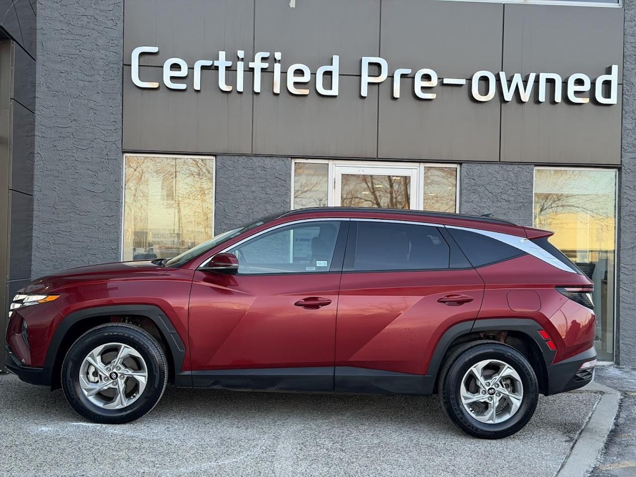 This LOW KM Hyundai Tucson TREND comes loaded with a fuel efficient and responsive 2.5L motor, automatic transmission with selectable drive modes, an amazing HTRAC ALL WHEEL DRIVE system with multi-terrain modes, PANORAMIC ROOF, SMART power liftgate, heated black leather seats with power drivers seat, LED daytime running lights, alloy wheels, automatic LED headlights, 10.25-inch touchscreen with NAVIGATION / APPLE CARPLAY / ANDROID AUTO, Bluetooth phone & audio connectivity, 60/40 split folding rear seats, Hyundais Bluelink, proximity key with push start ignition, heated leather wrapped steering wheel, dual-zone automatic climate control, Forward Collision Avoidance Assist, Lane Follow Assist, Lane Departure Warning, Lane Keep Assist, High Beam Assist, Blind Spot Detection system, rear-cross traffic collision assist, back-up camera and much more!!!