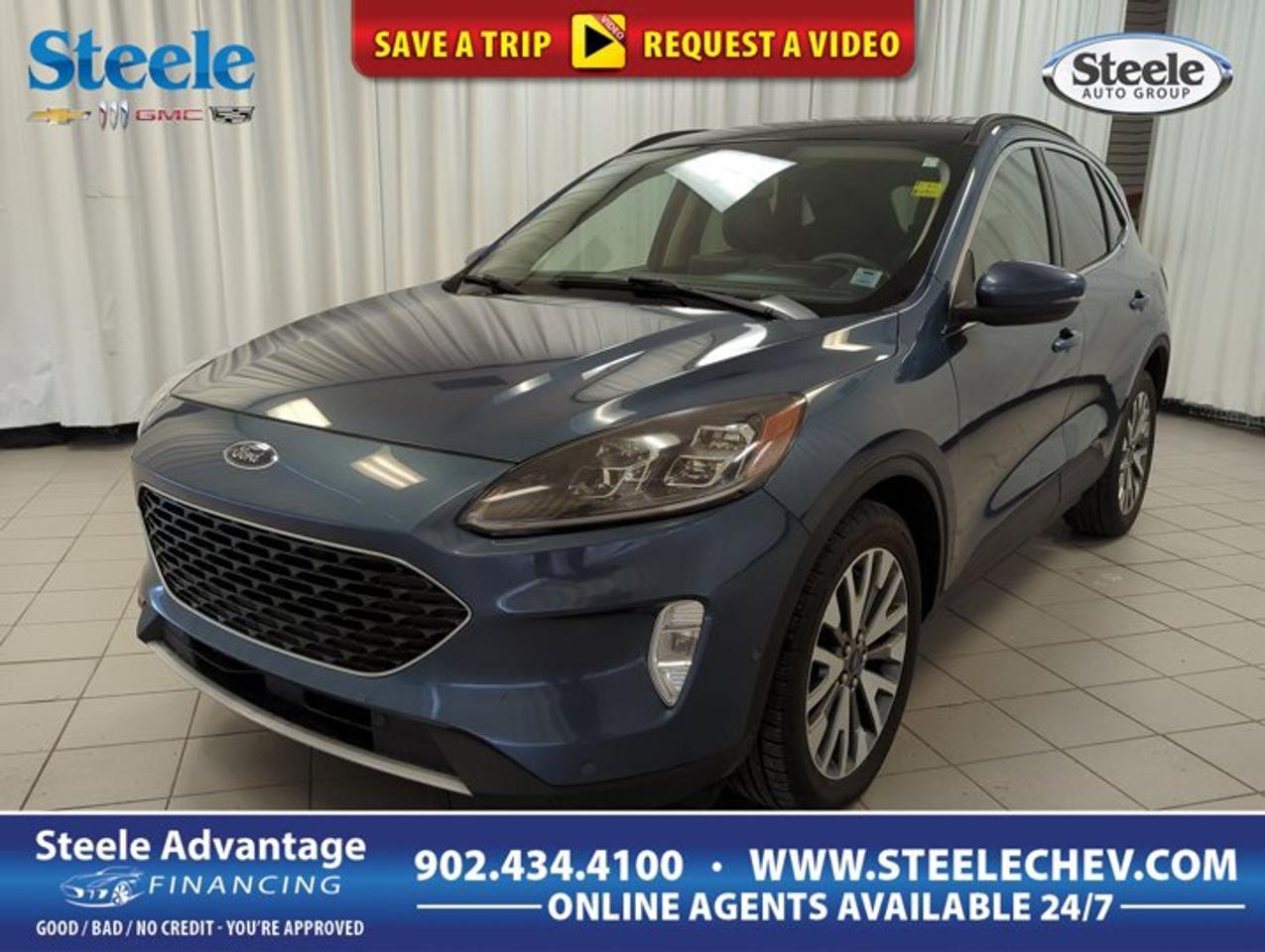 Experience the perfect blend of efficiency and versatility with the 2020 Ford Escape Titanium Hybrid, now available at Steele Chevrolet Buick GMC in Dartmouth. This used SUV stands out with its eye-catching blue exterior, four-door practicality, and all-wheel drive capability. With a fuel-efficient Gas/Electric I-4 2.5 L hybrid engine and a smooth CVT transmission, its designed for those who value both performance and sustainability. With 133,968 km on the odometer, this Escape Titanium Hybrid is ready for many more adventures.FEATURES OF THE Escape Titanium HybridHybrid powertrain for excellent fuel efficiencyAll-wheel drive for enhanced tractionBlue exterior finish for modern appealFour-door configuration for easy accessADVANCED SAFETY FEATURESComprehensive airbag system for occupant protectionAnti-lock braking system for controlled stopsTraction control for confident handlingStability control for added safetyPERFORMANCE AND EFFICIENCYGas/Electric I-4 2.5 L hybrid engineContinuously variable transmission (CVT)All-wheel drive for various road conditionsImpressive fuel economy for longer journeysCOMFORT AND CONVENIENCESpacious interior with seating for fiveFour-door access for easy entry and exitAdjustable seating for personalized comfortAmple legroom for driver and passengersTECHNOLOGY AND CONNECTIVITYHybrid system display for real-time efficiencyIntegrated controls for smooth operationModern dashboard layout for ease of useEssential connectivity features for daily needsCARGO SPACEFlexible rear cargo areaSplit-folding rear seats for added spaceGenerous storage for luggage and gearConvenient load-in height for easy accessWHAT OTHER OWNERS LIKEExcellent fuel economy from hybrid systemConfident all-wheel drive performanceComfortable ride quality for long tripsPractical cargo space for daily useThis 2020 Ford Escape Titanium Hybrids VIN is: 1FMCU9DZ7LUB45897.