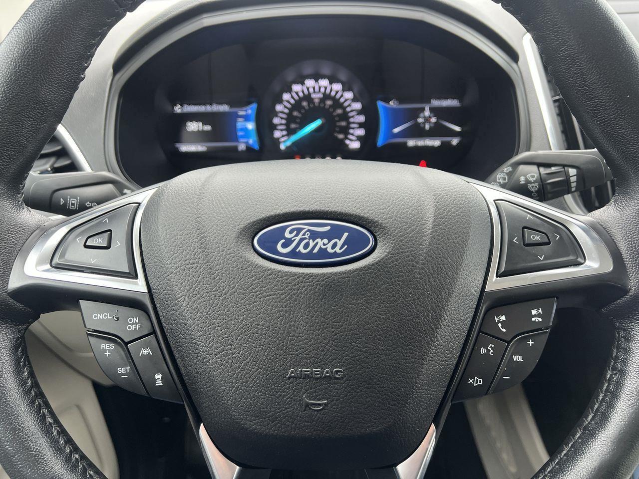 2022 Ford Edge Titanium AWD, MOONROOF, HEATED LEATHER SEATS, BACK UP CAM, NAV, POWER LIFTGATE!! Photo