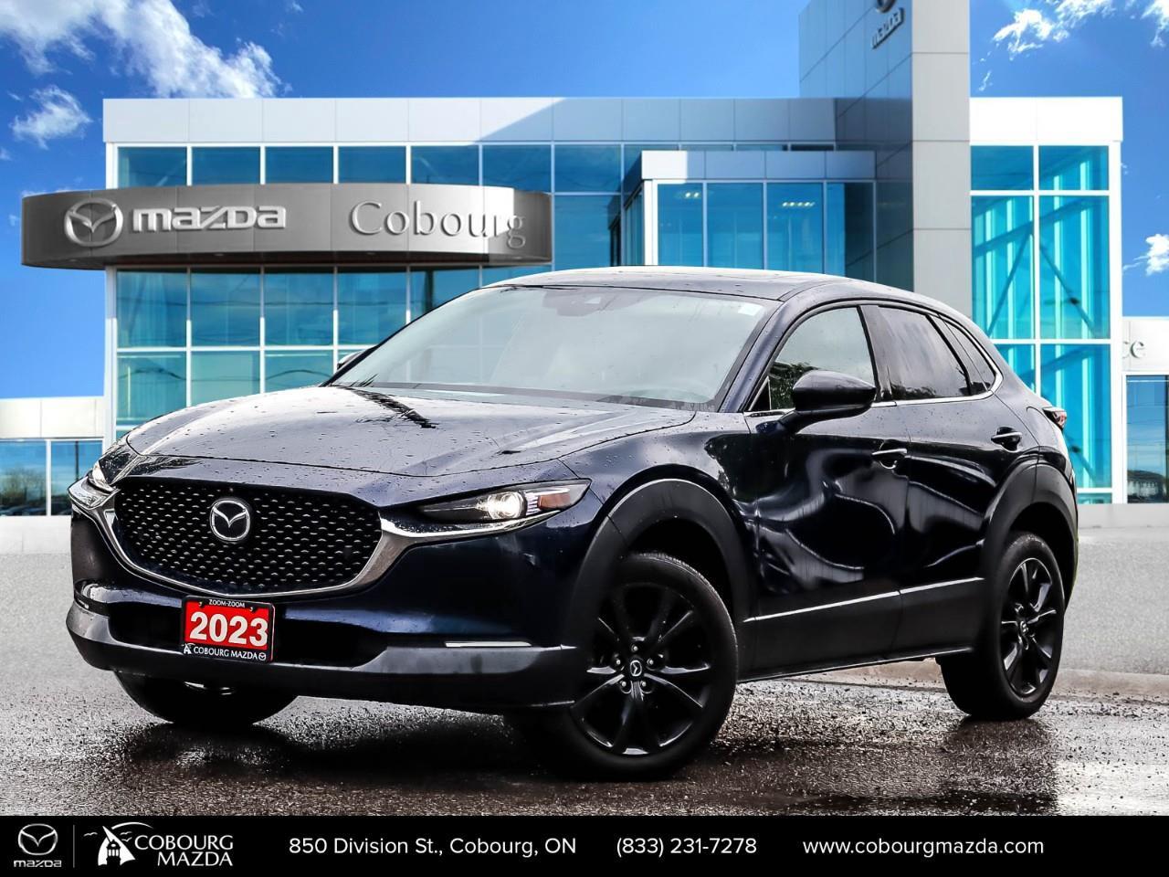 <p>The stunning <strong>2023 Mazda CX-30 GT w/Turbo</strong> comes in an elegant Blue shade and offers an exceptional driving experience with its AWD drivetrain and precise handling. This SUV is designed to elevate your journeys with its combination of power and style.</p><p>The exterior of this CX-30 dazzles with alloy wheels that complement its aerodynamic shape, perfect for the streets of Canada. Inside, you're greeted with a sophisticated Black leather interior, complete with heated seats and a leather-wrapped steering wheel, providing a luxurious touch and optimal comfort throughout your drives.</p><p>The CX-30 is loaded with modern technology features to keep you connected and safe. With the advanced navigation system, Bluetooth connectivity, and smart device integration, youll enjoy every ride. Safety is top-notch, featuring a backup camera, lane assist, and adaptive cruise control, along with a heads-up display to enhance your overall driving awareness.</p><p>This compact SUV is ideal for families or individuals who appreciate a blend of high performance, safety, and comfort. Dont miss your chance to experience this remarkable vehicle. Contact our dealership today to learn more and schedule your test drive.</p>
