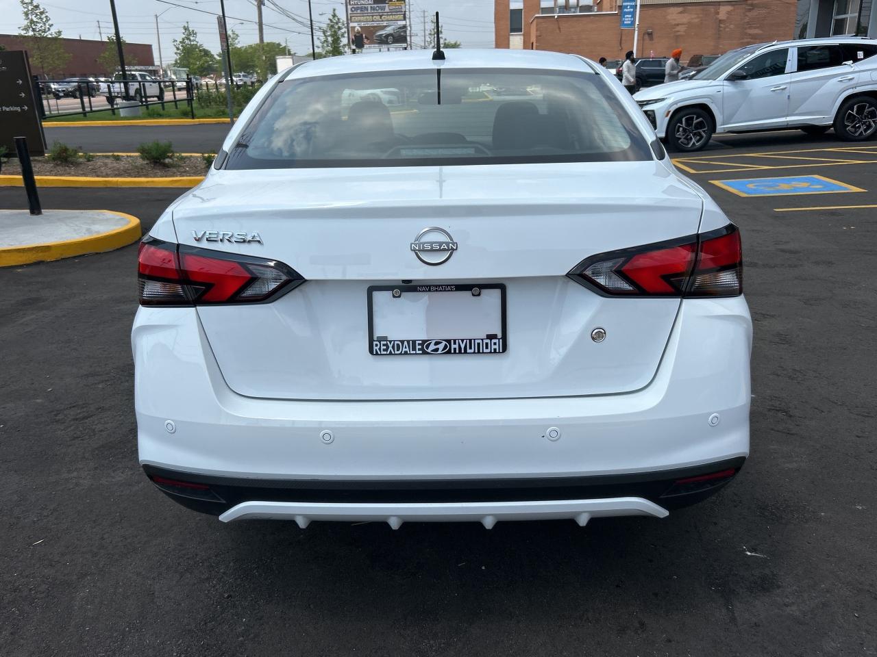 2024 Nissan Versa S FWD CVT   CLEAN CAR FAX Photo
