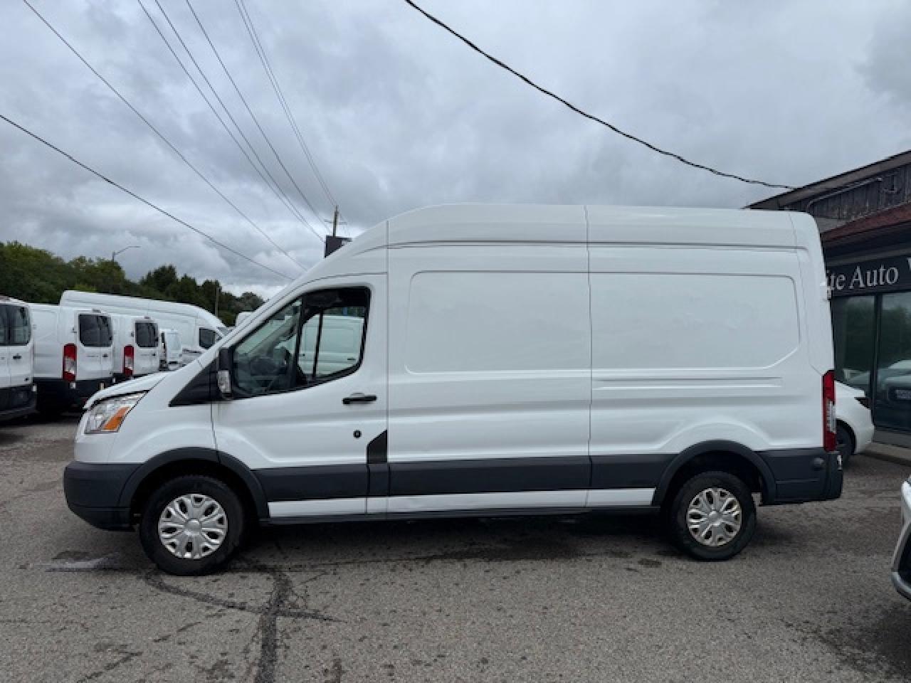 2016 Ford Transit Cargo Van T-350 148  Hi Rf 9500 GVWR Sliding RH Dr Photo