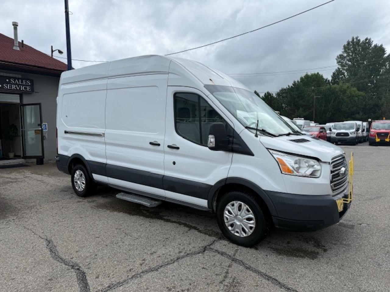 2016 Ford Transit Cargo Van T-350 148  Hi Rf 9500 GVWR Sliding RH Dr Photo