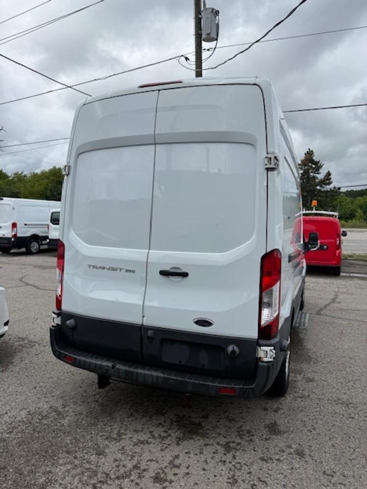 2016 Ford Transit Cargo Van T-350 148  Hi Rf 9500 GVWR Sliding RH Dr Photo