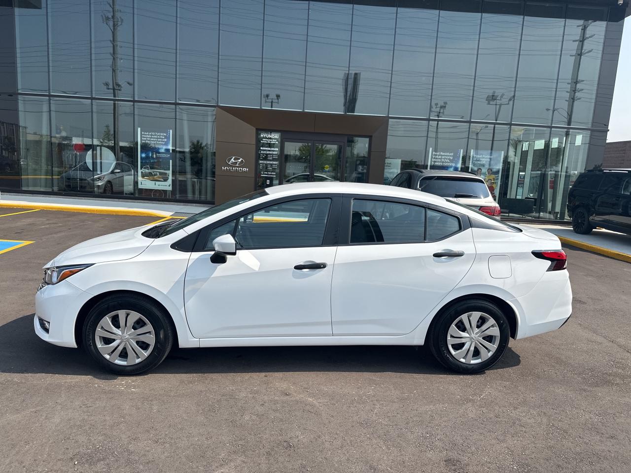 2024 Nissan Versa S CVT   CLEAN CAR FAX Photo3