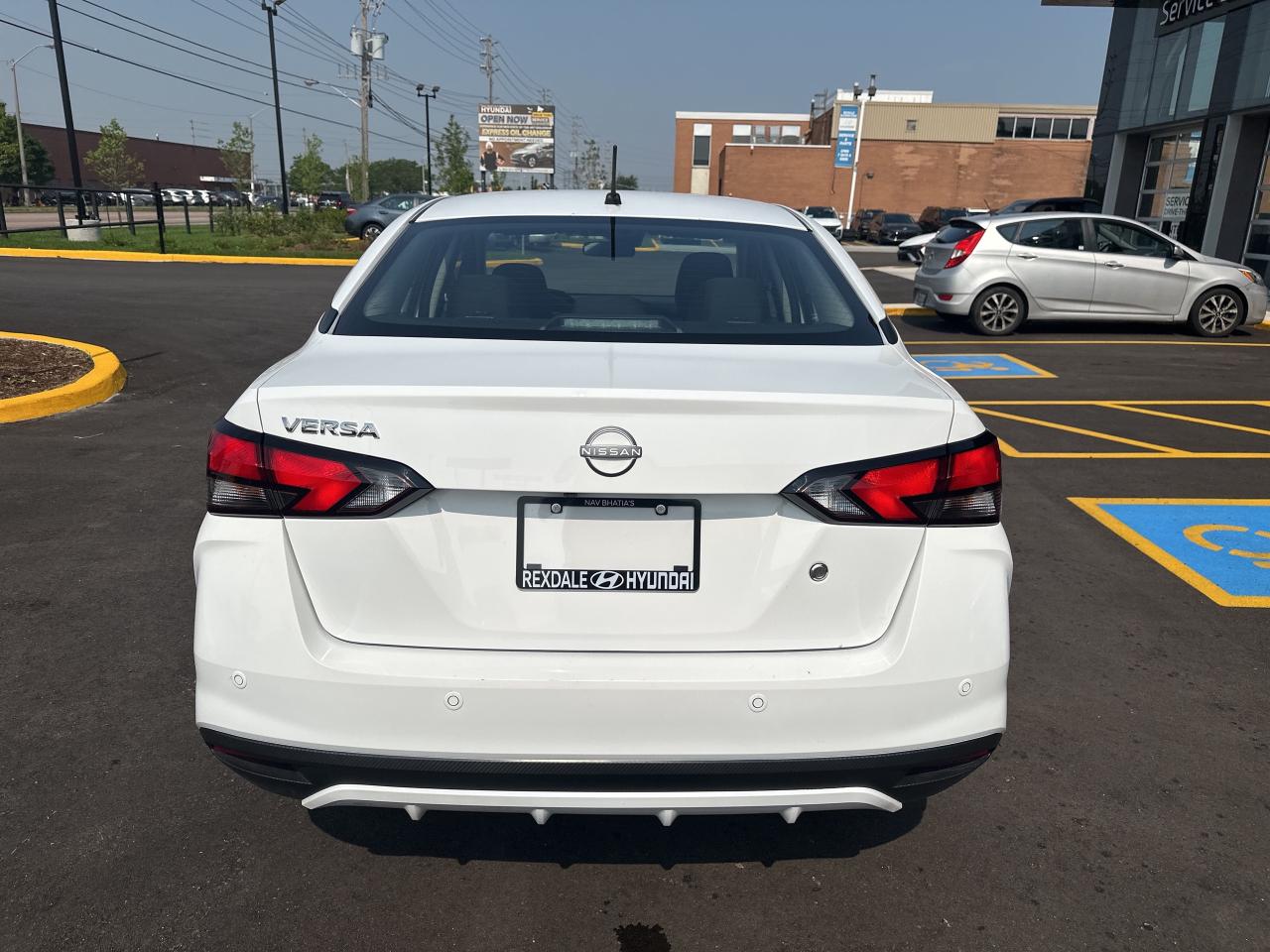 2024 Nissan Versa S CVT   CLEAN CAR FAX Photo