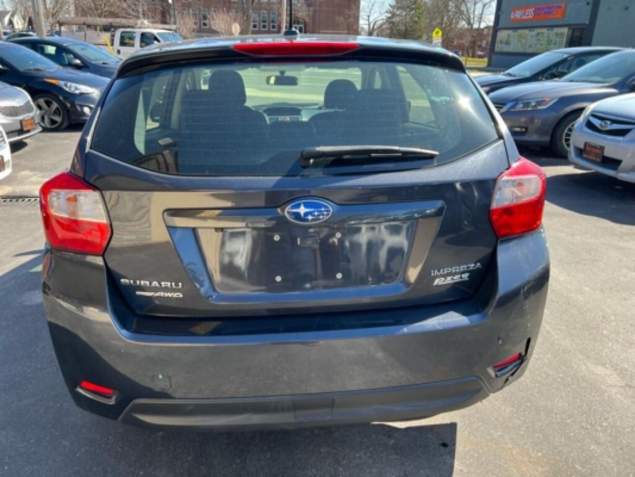 2015 Subaru Impreza 2.0i 4dr All-wheel Drive Sedan CVT Photo