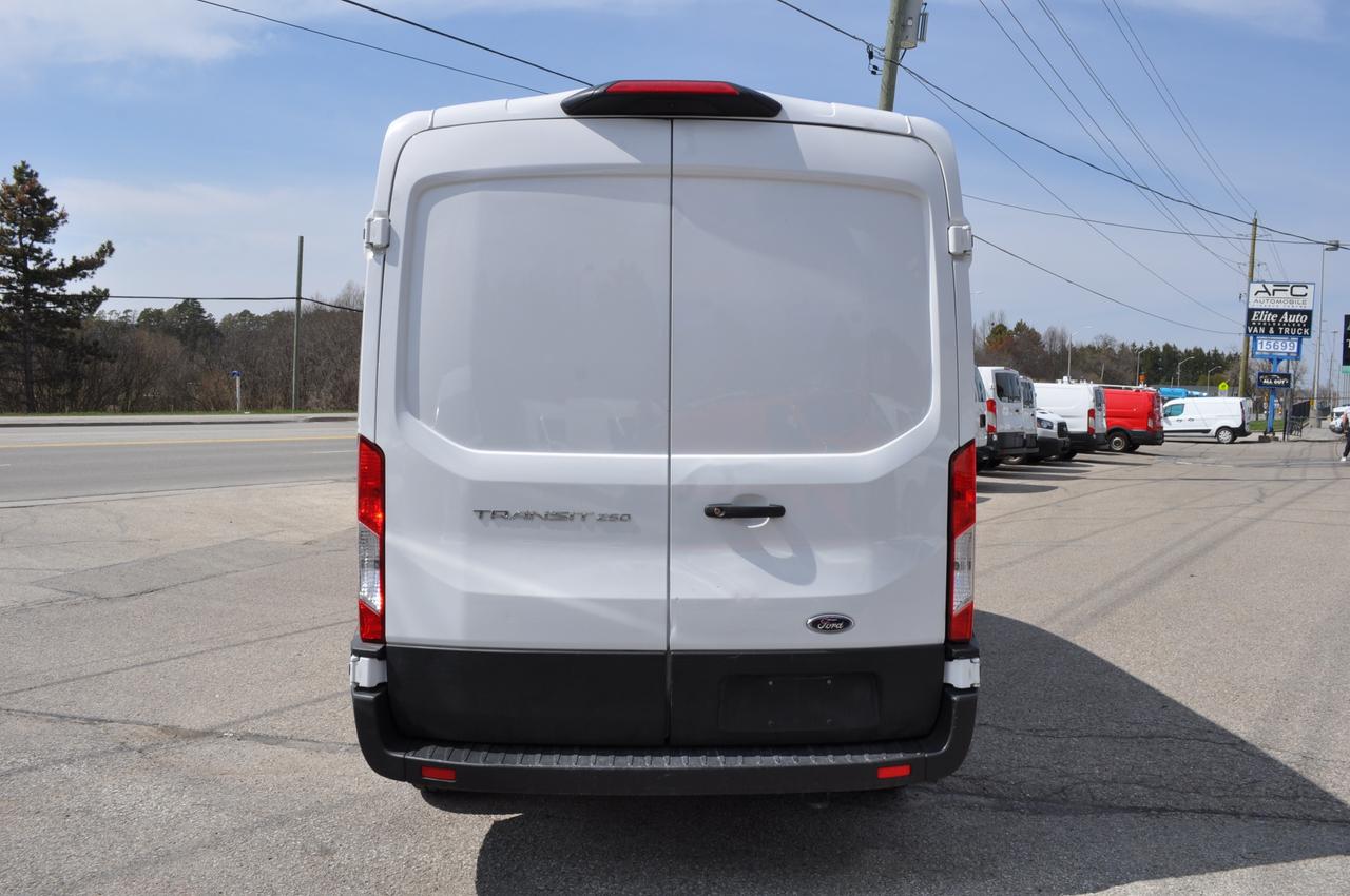 2020 Ford Transit Cargo Van MID ROOF TRANSIT. TWO YEAR WARRANTY INCLUDED. Photo