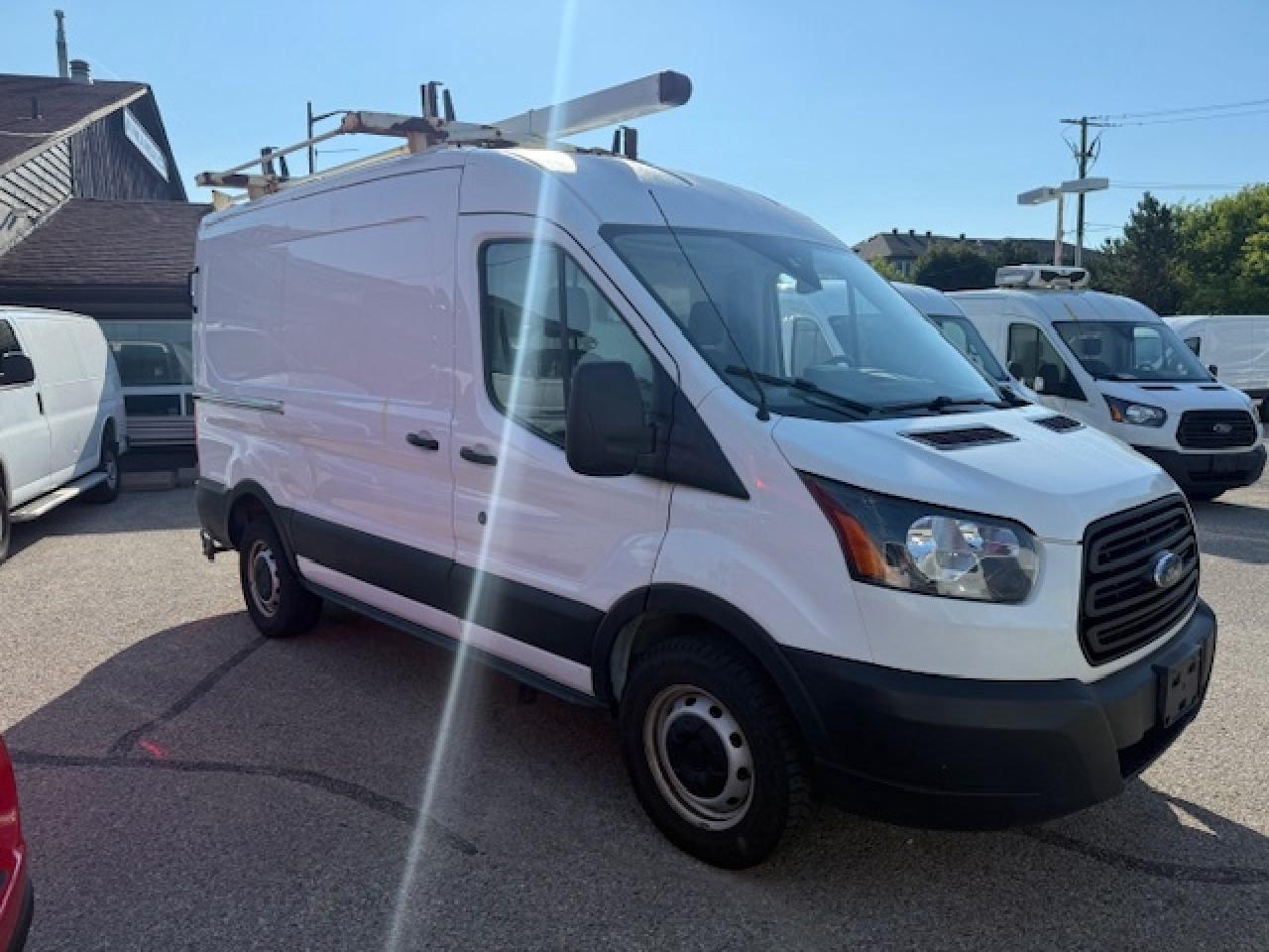2019 Ford Transit Van T250 Mid Roof with Shelving, Divider, Roof Rack Photo
