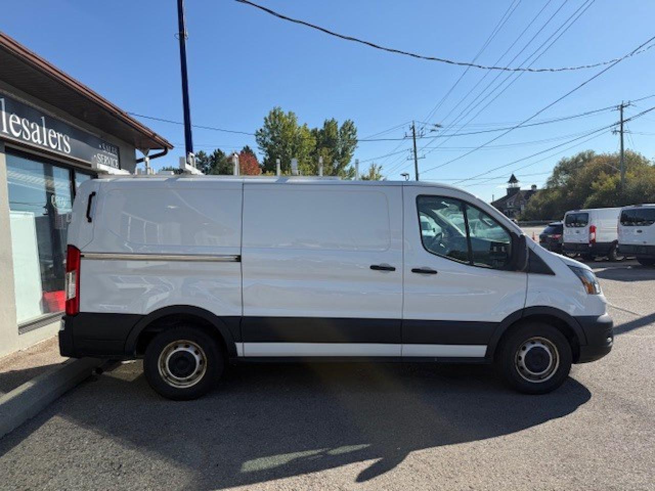 2021 Ford Transit Cargo Van T-150 130  Low Rf 8670 GVWR RWD Photo
