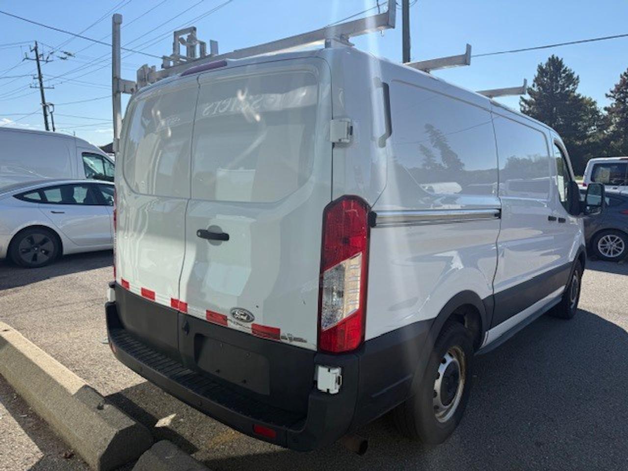 2021 Ford Transit Cargo Van T-150 130  Low Rf 8670 GVWR RWD Photo