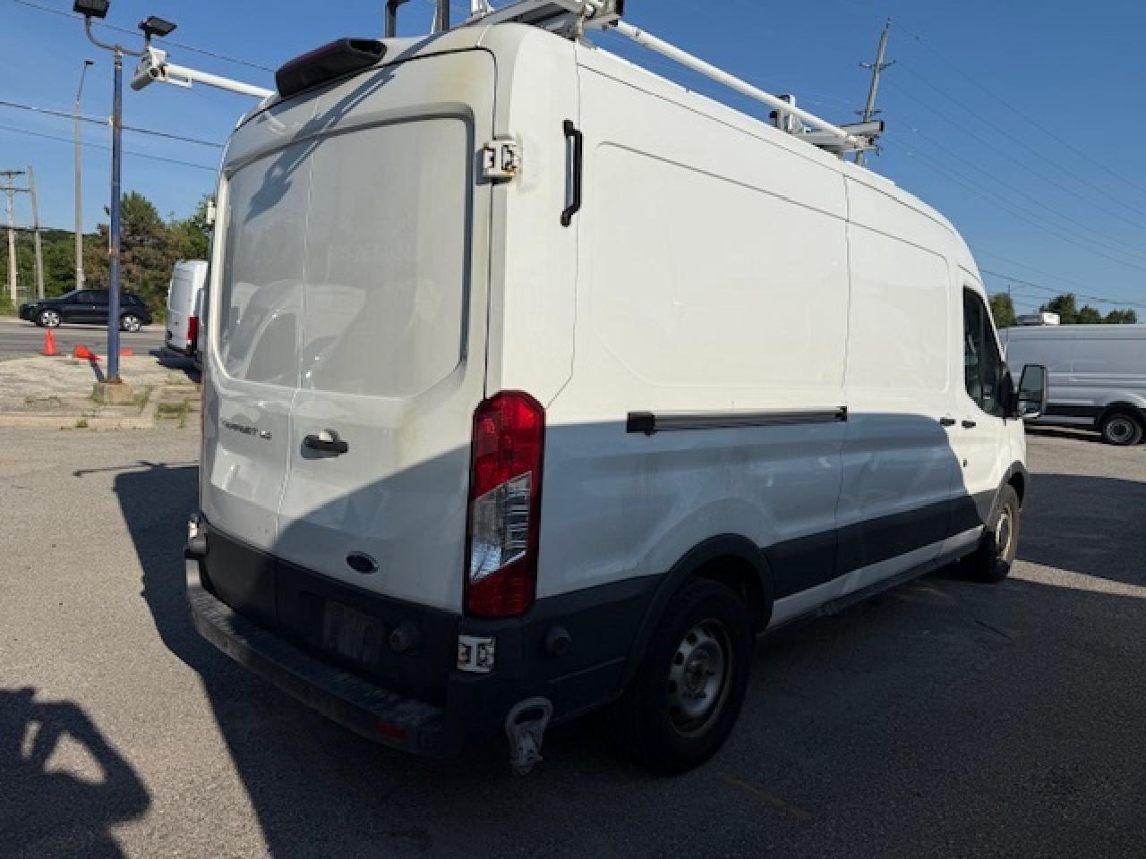 2018 Ford Transit Van $17,995.00 Mid Roof Transit. Photo