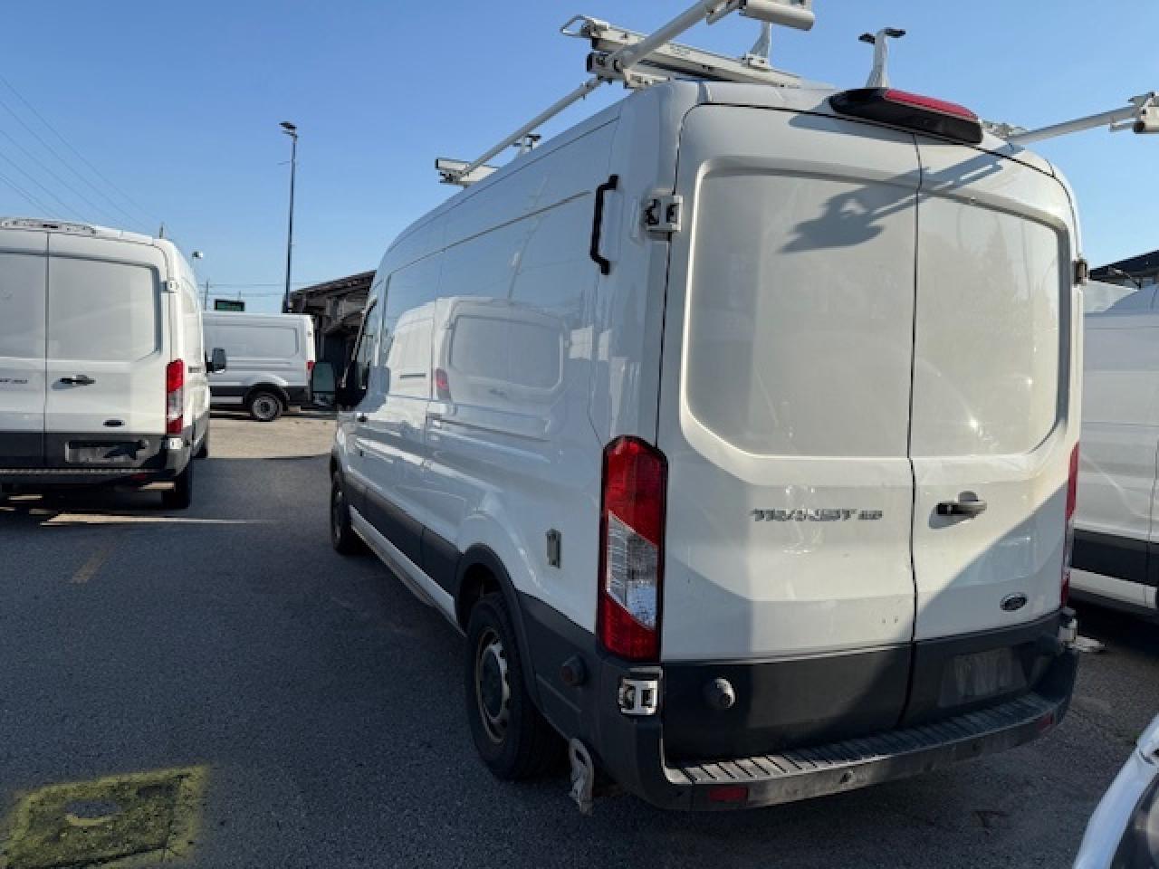 2018 Ford Transit Van $17,995.00 Mid Roof Transit. Photo