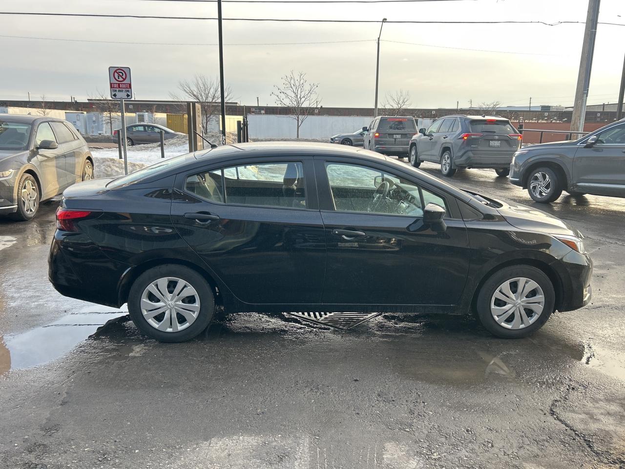 2024 Nissan Versa S CVT   CLEAN CAR FAX Photo