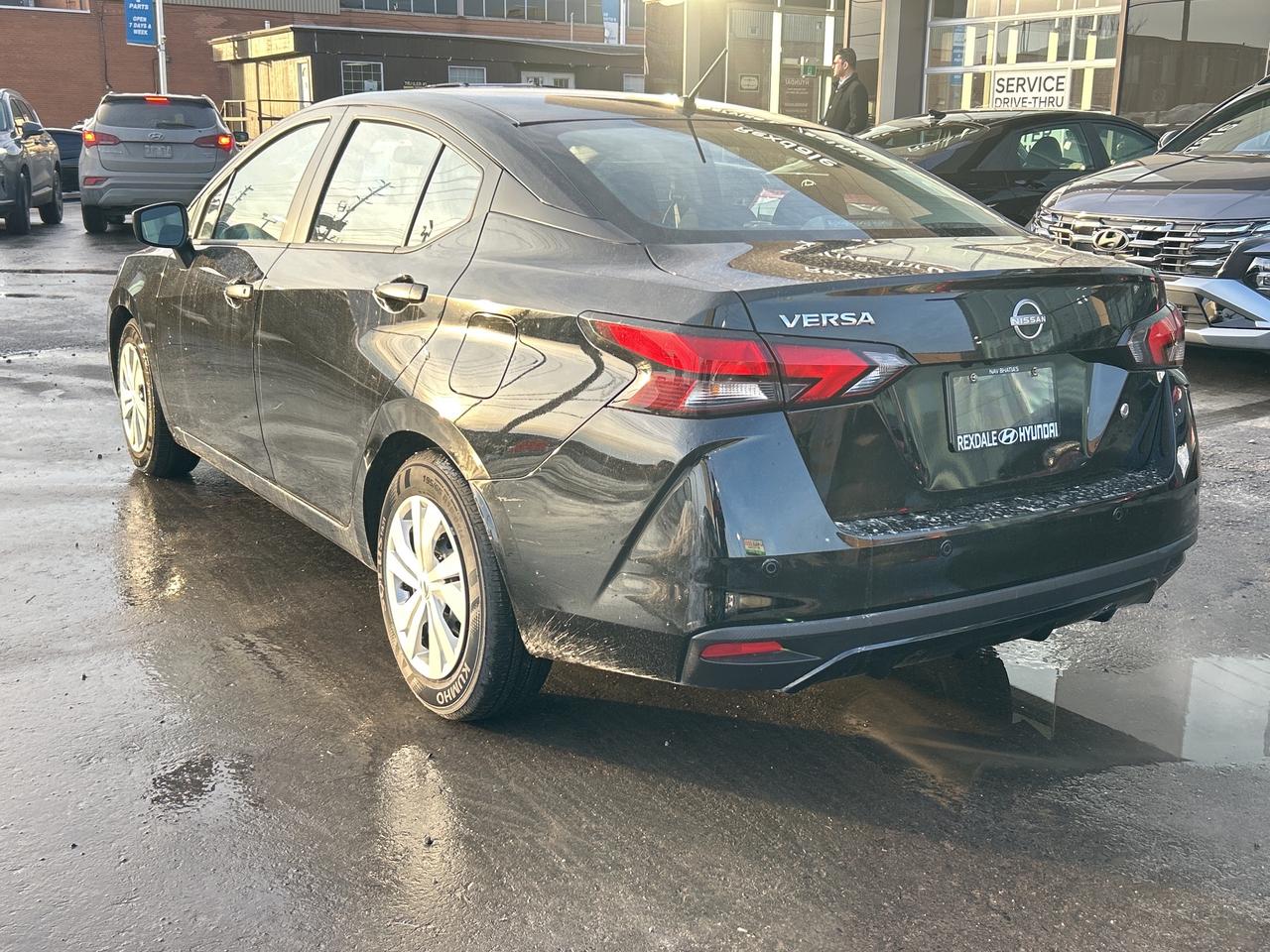 2024 Nissan Versa S CVT   CLEAN CAR FAX Photo2