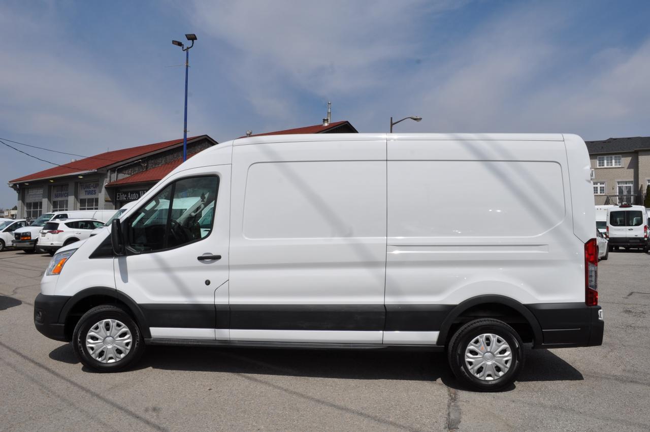 2020 Ford Transit Cargo Van Mid roof transit. FREE TWO YEAR WARRANTY Photo