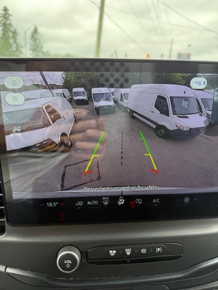 2023 Ford Transit Cargo Van Mid Roof, 30,000 Kms. navigation. Photo