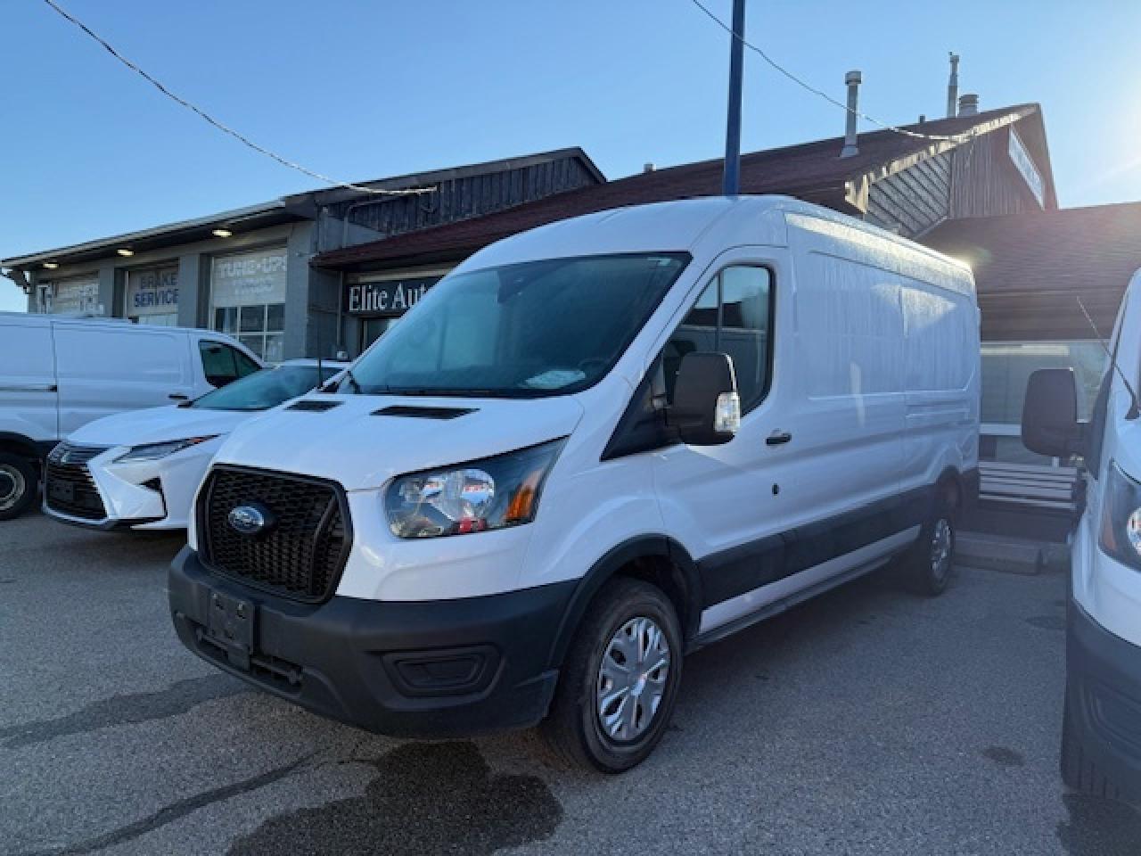 2023 Ford Transit Cargo Van 35,000 Kms from new. Mid Roof Transit. Photo