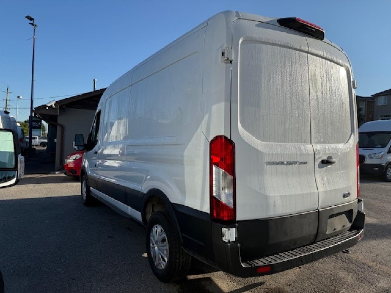 2023 Ford Transit Cargo Van 35,000 Kms from new. Mid Roof Transit. Photo
