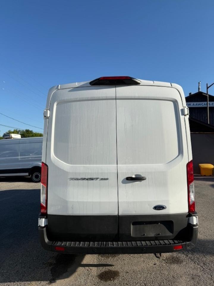 2023 Ford Transit Cargo Van 35,000 Kms from new. Mid Roof Transit. Photo