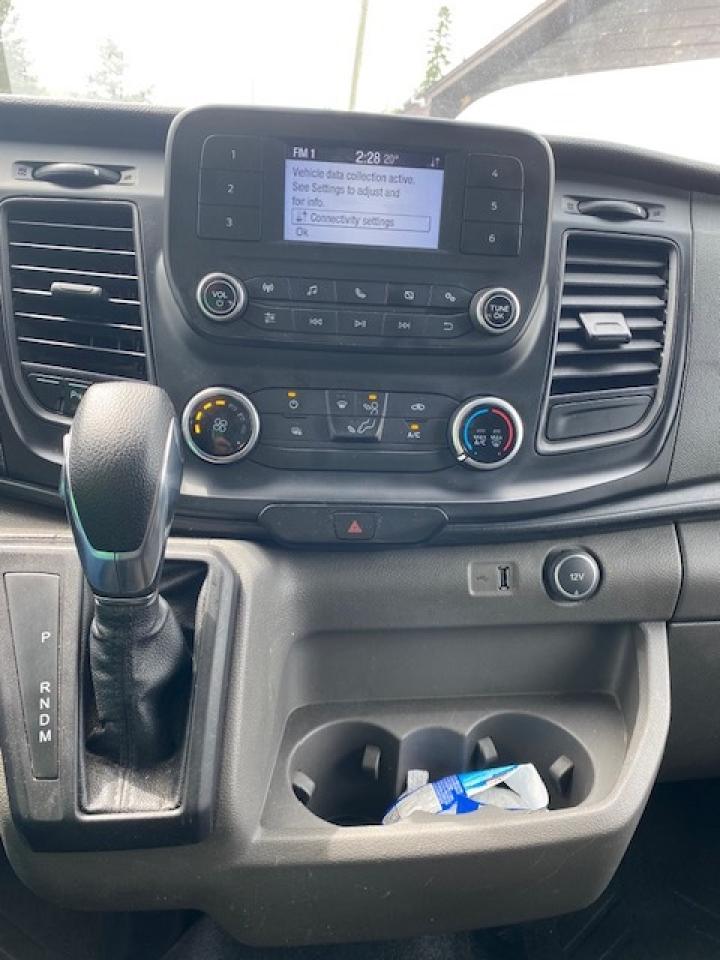 2020 Ford Transit Cargo Van Mid roof Transit. 91,000 Kms Photo