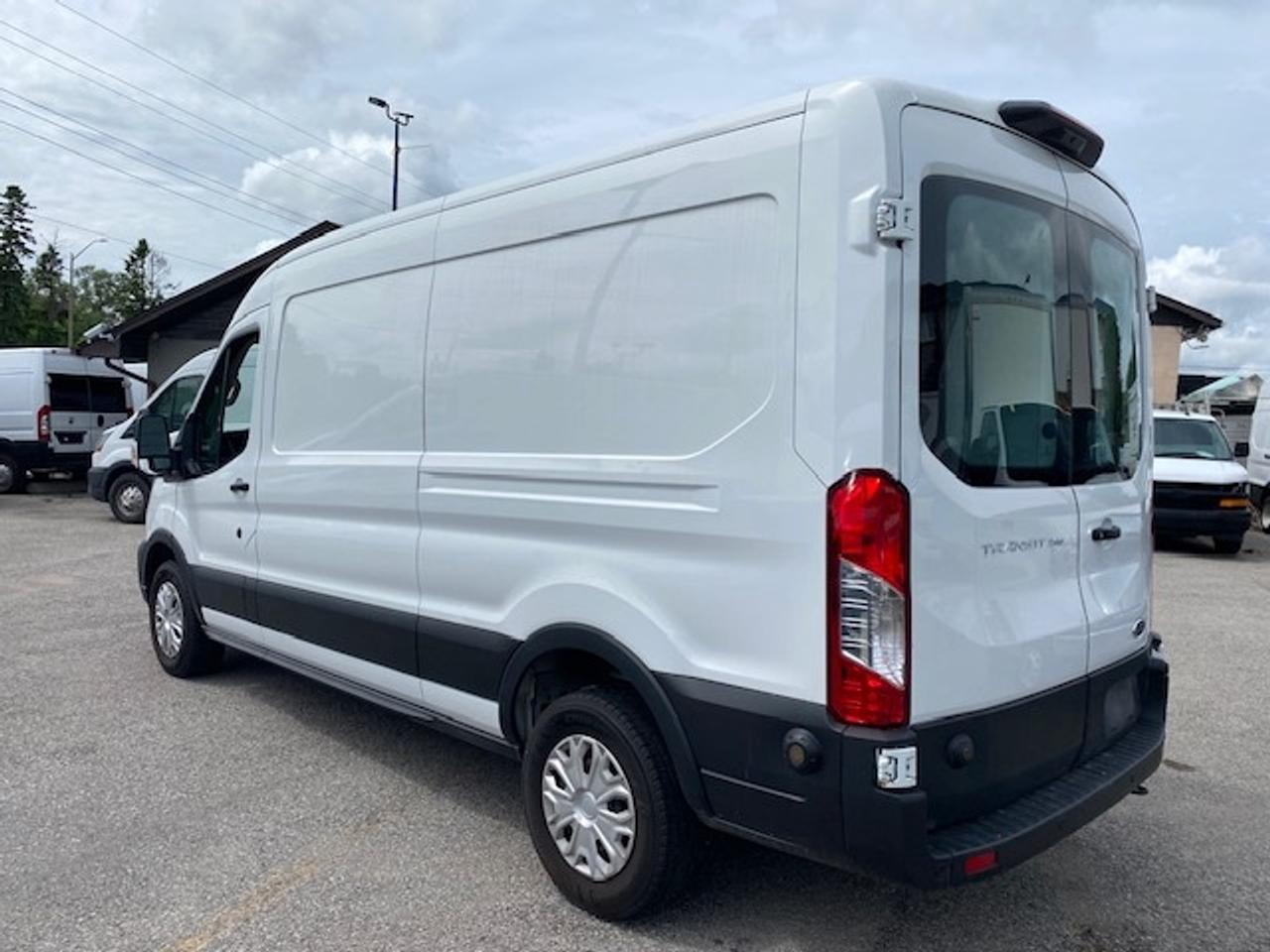 2020 Ford Transit Cargo Van Mid roof Transit. 91,000 Kms Photo4