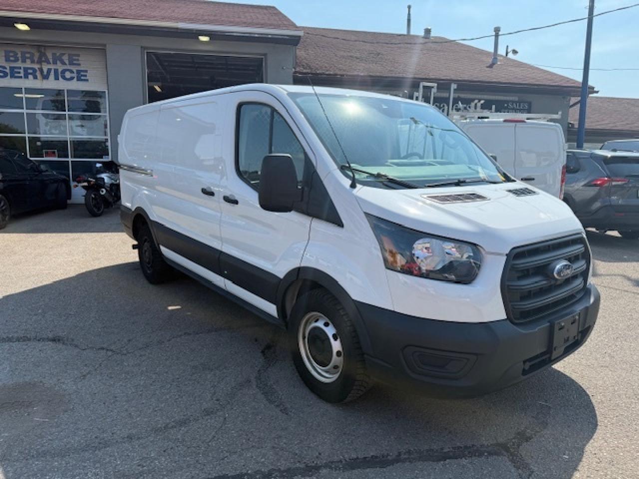 2020 Ford Transit Cargo Van Divider, Shelving, Power seat. Photo