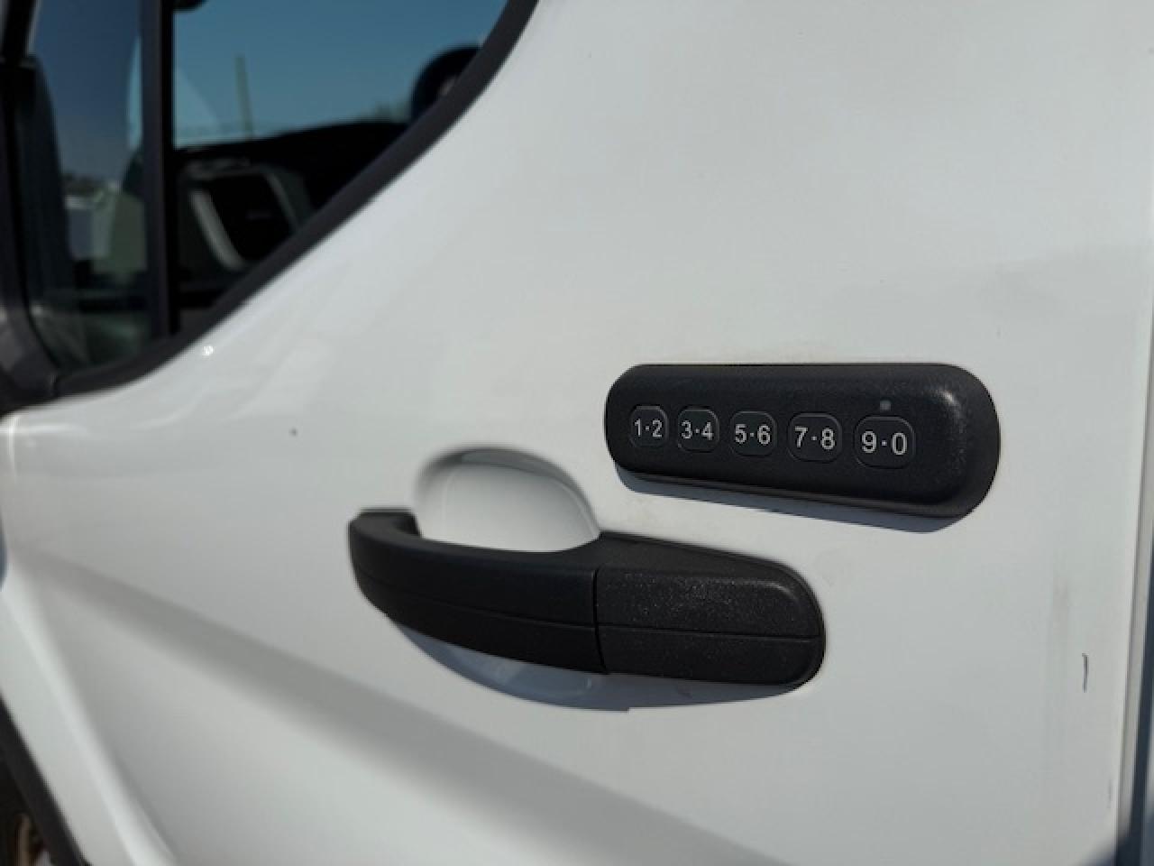 2020 Ford Transit Cargo Van Divider, Shelving, Power seat. Photo