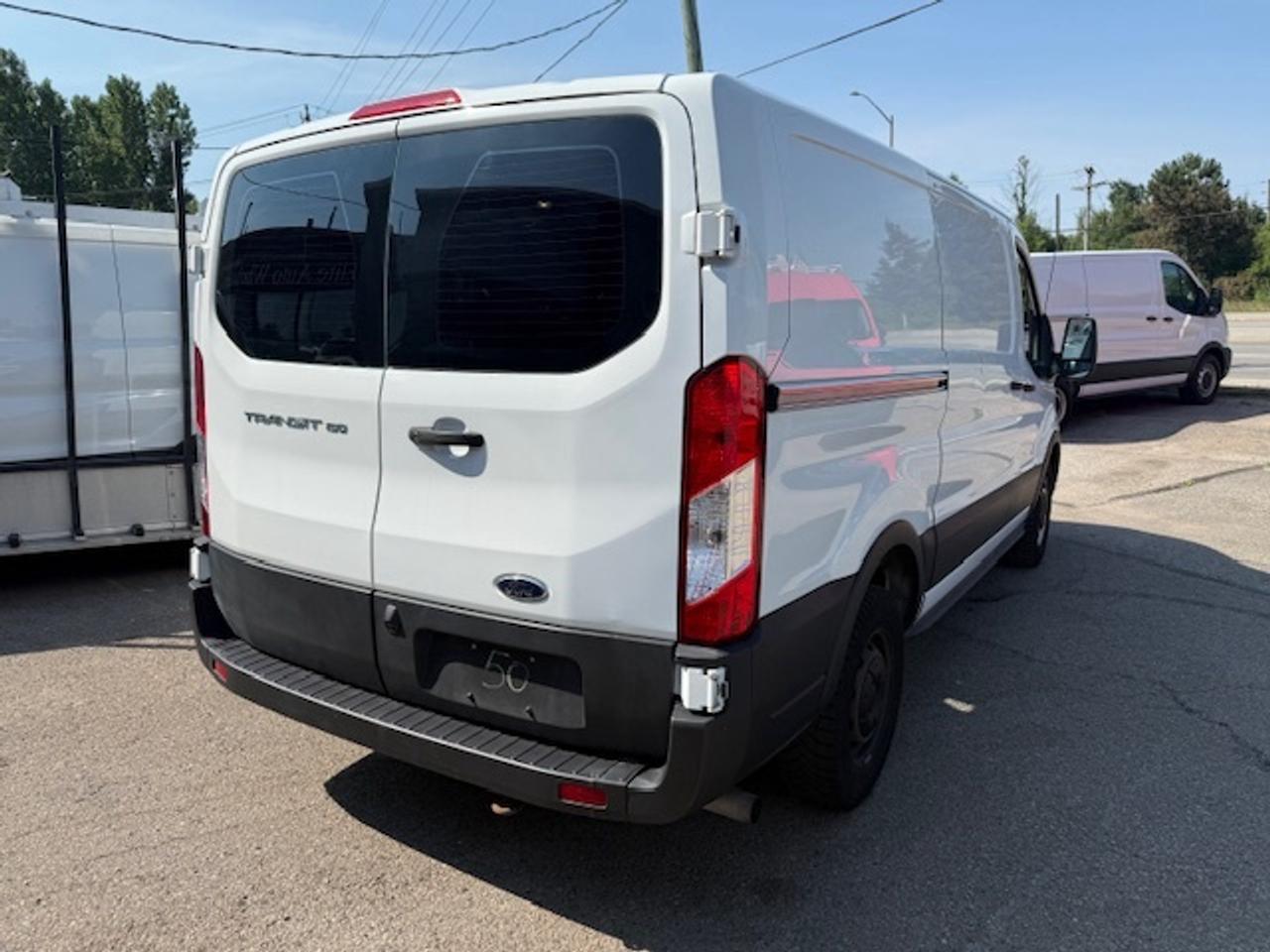 2020 Ford Transit Cargo Van Divider, Shelving, Power seat. Photo