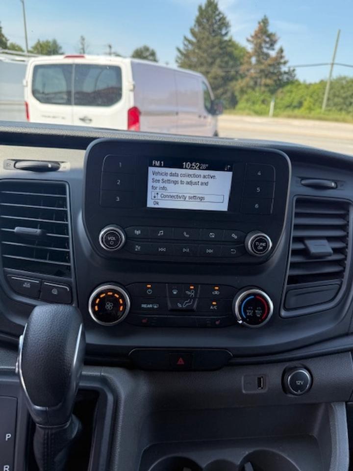 2020 Ford Transit Cargo Van Divider, Shelving, Power seat. Photo