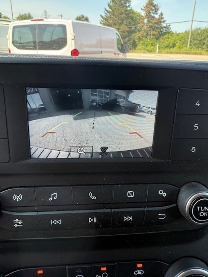 2020 Ford Transit Cargo Van Divider, Shelving, Power seat. Photo