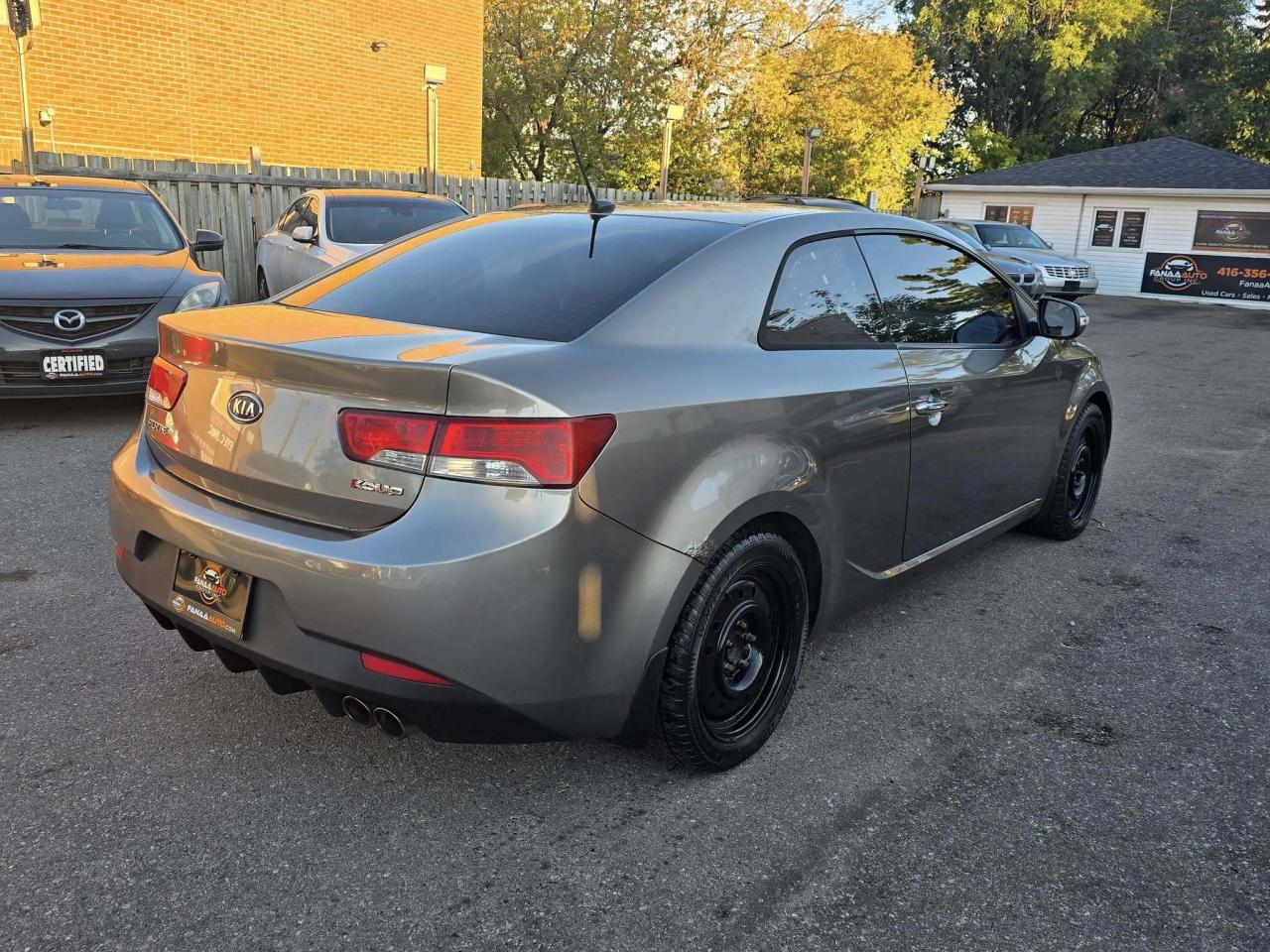 2010 Kia Forte Koup 2dr Cpe Auto SX Photo