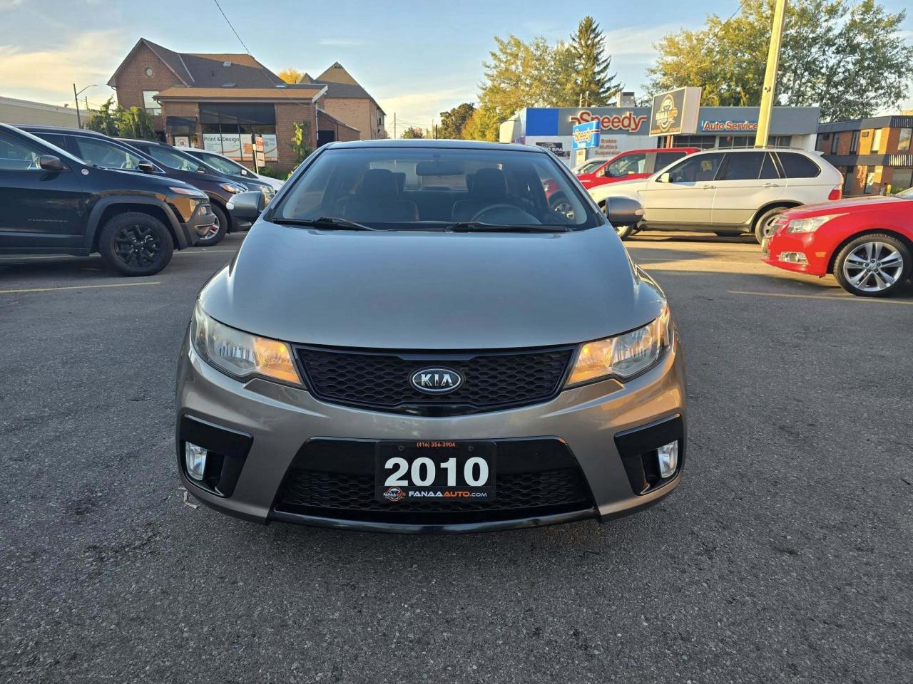 2010 Kia Forte Koup 2dr Cpe Auto SX Photo