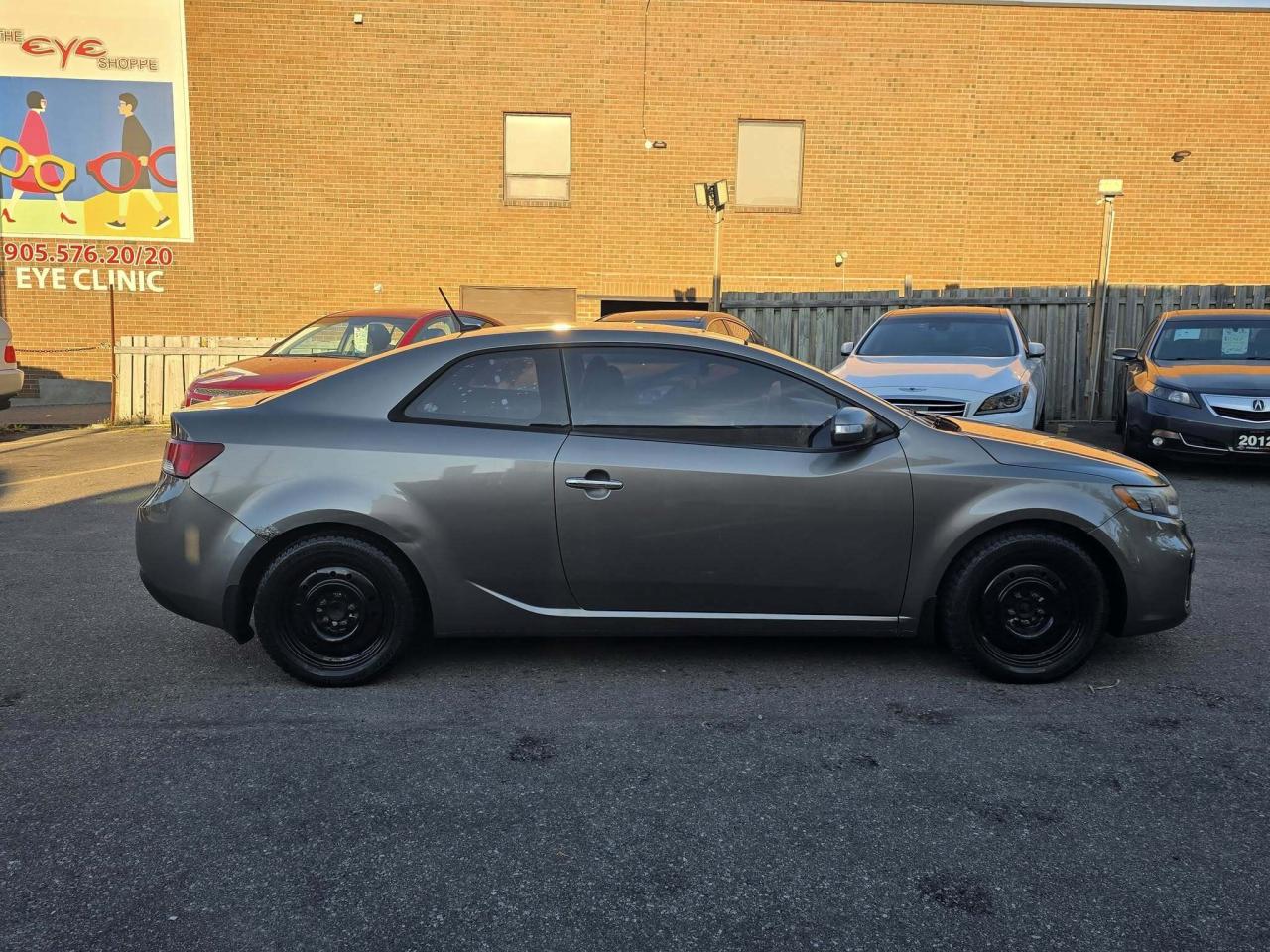 2010 Kia Forte Koup 2dr Cpe Auto SX Photo