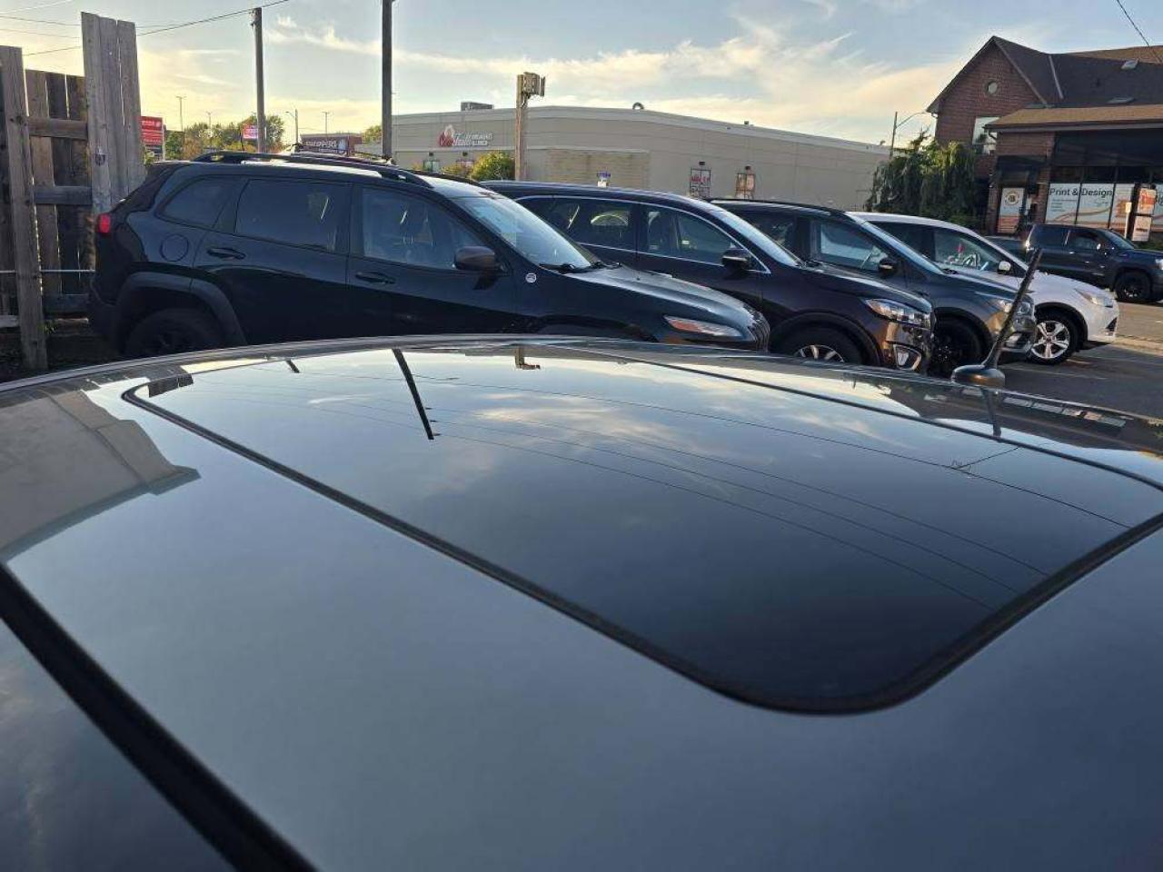 2010 Kia Forte Koup 2dr Cpe Auto SX Photo