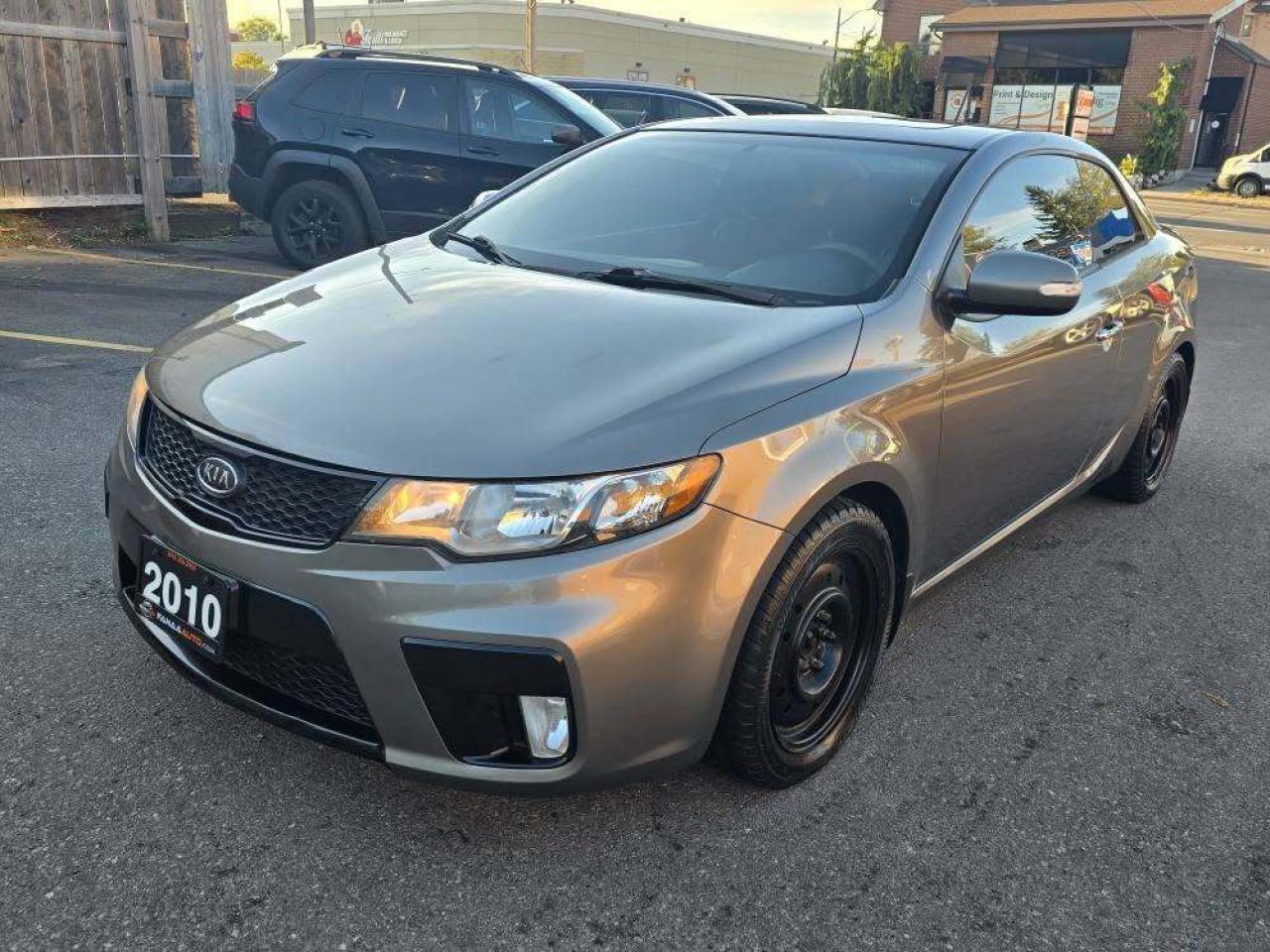 2010 Kia Forte Koup 2dr Cpe Auto SX Photo