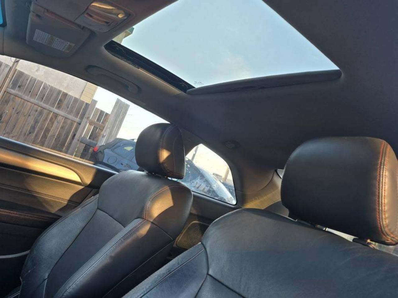 2010 Kia Forte Koup 2dr Cpe Auto SX Photo