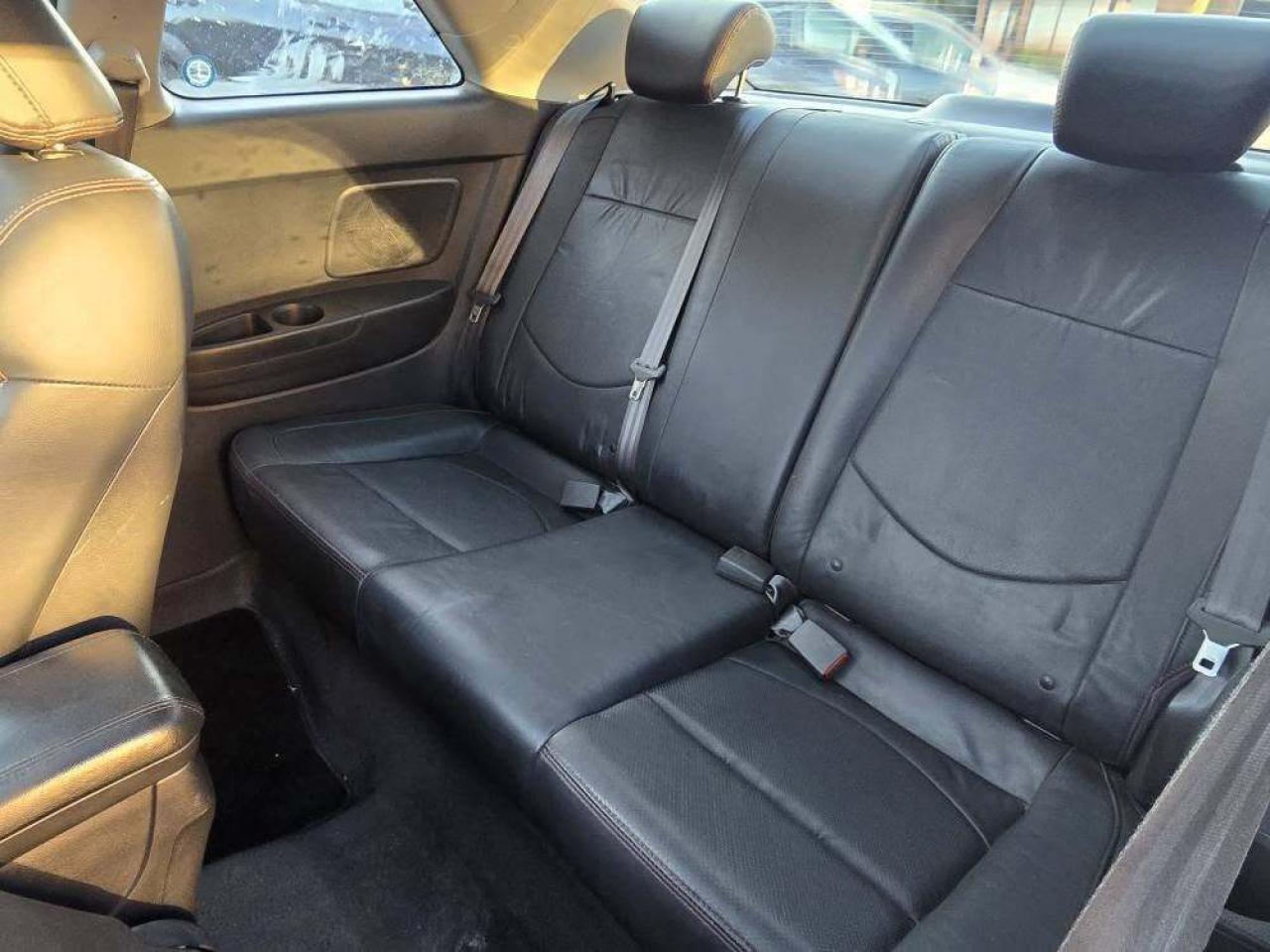 2010 Kia Forte Koup 2dr Cpe Auto SX Photo