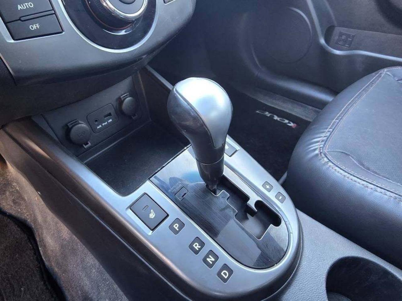 2010 Kia Forte Koup 2dr Cpe Auto SX Photo